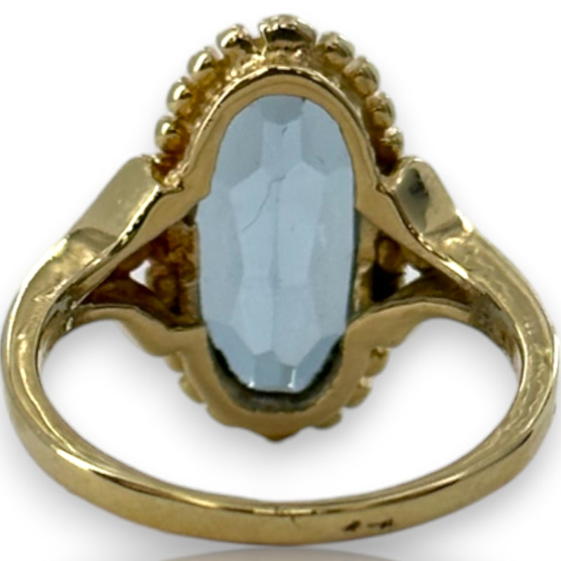 1970-80s Victorian Revival Era Solid 14kt Yellow Gold and Lab Created Blue Spinel Long Oval Solitaire Ring