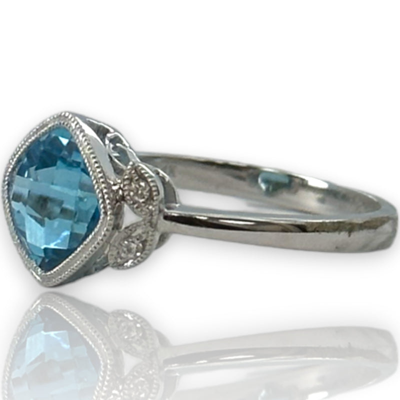 Legacy Custom Jewelers Solid 14kt White Gold and Checkerboard Cut Bezel Set Blue Topaz Ring with Diamond Leaf Milgrain Details Size 7