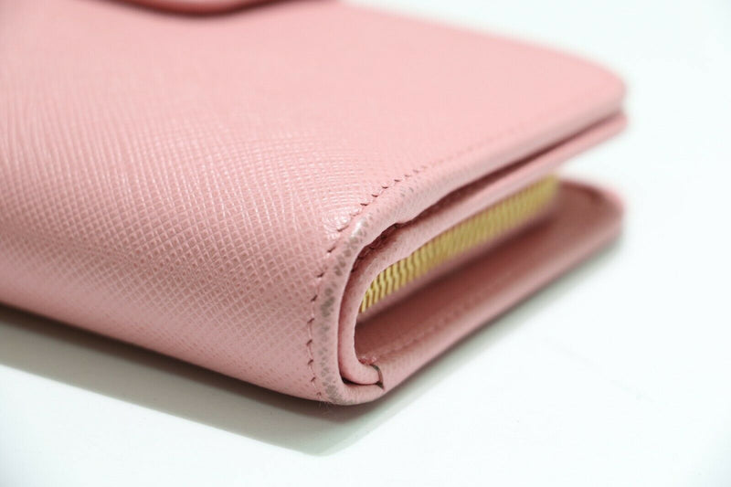 PRADA: Saffiano Metal Zip Around Wallet Cammeo - Pink – GEM Pawnbrokers